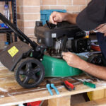 Mechanic,Working,On,Lawn,Mower