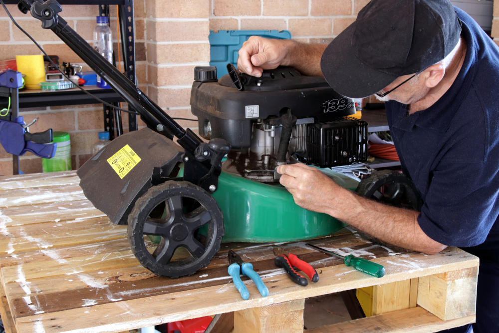 Mechanic,Working,On,Lawn,Mower
